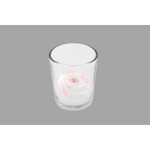 bougie rose dans pot en verre blanc